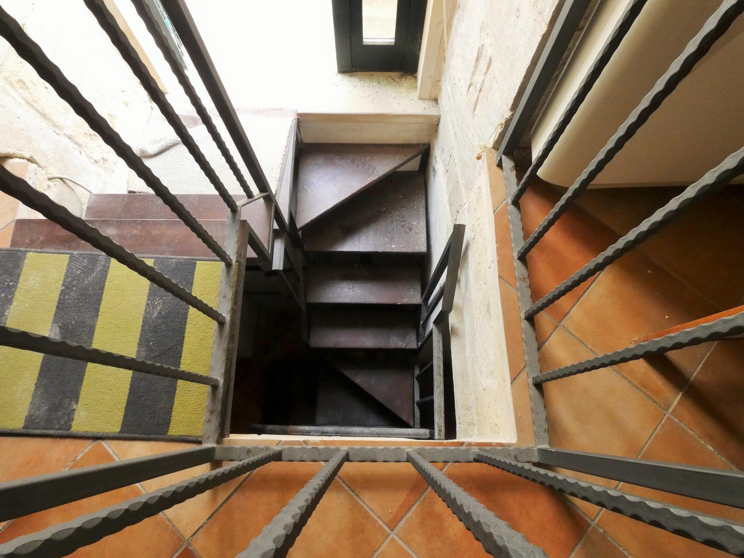 Stairs leading down to the basement