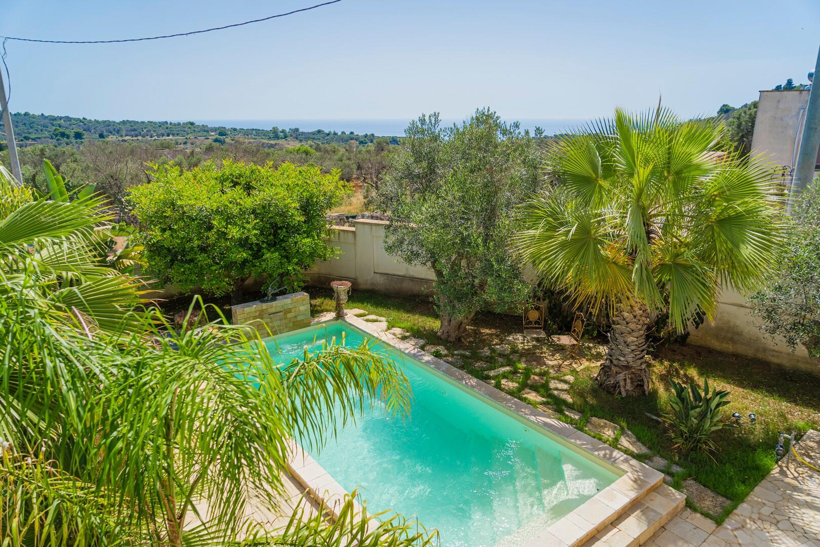 Vista mare a piscina